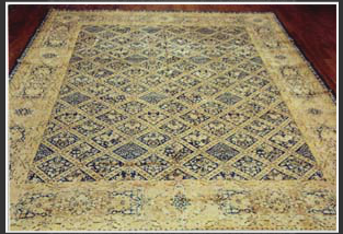 The more modern designs mainly developed for the Western market in the late 19th century are either Aubussons or Koran (Quran) medallion-and-corners with an open field. The open field is actually an important distinguishing characteristic of these modern Kerman rugs. The tradition Kerman designs consist of Shah Abbasi medallion-and-corner, all-over floral, all-over botch, striped designs, paneled garden, tera-of-life, prayer, vase, garden, hunting, animal, and the famous elaborate pictorials using both Persian and European themes. Usually 15 to 30 colors are used in one rug. The two most common colors use in Antique and semi-antique rugs are rich red and red-blue. More recent rugs tend to have pastel colors such as lime green, pink, ivory and grey-blue. Turquoise, orange, champagne and beige are also among the commonly used colors. Kerman rugs are woven with asymmetric (Persian) knot.